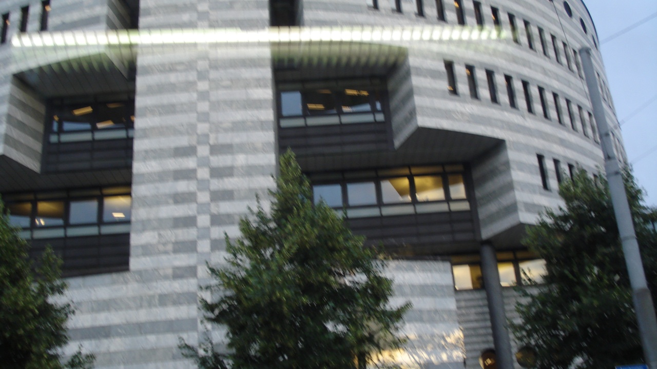 Modern Swiss city skyline with corporate headquarters and research labs.