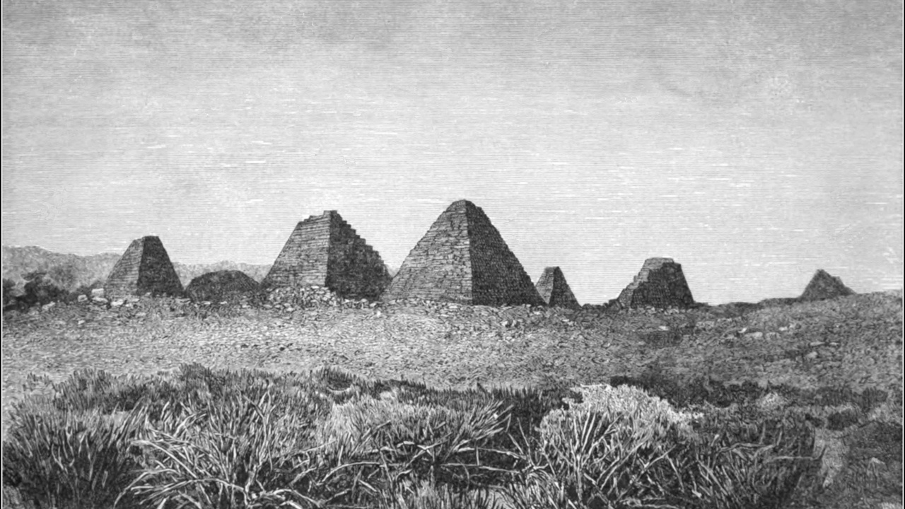 Meroe pyramids at sunrise with desert sand