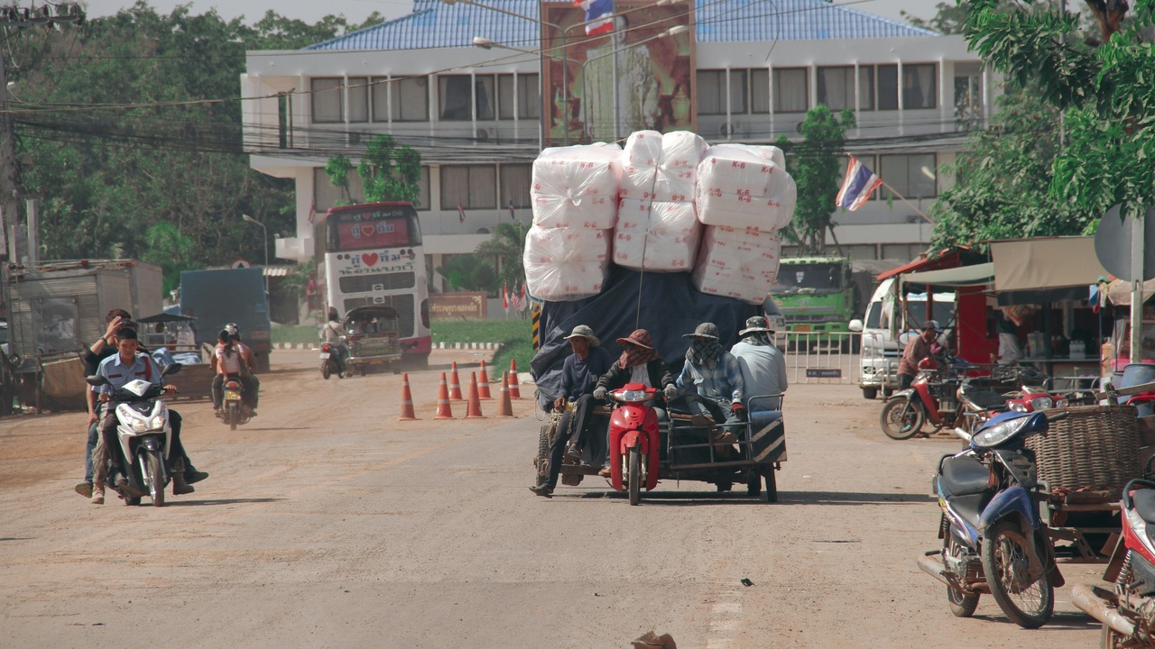 Industrial area and transit hub in Vietnam showing factories and transport activity