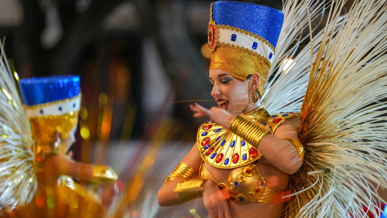 Masked dancers at La Vega Carnival celebrating pre-Lenten traditions
