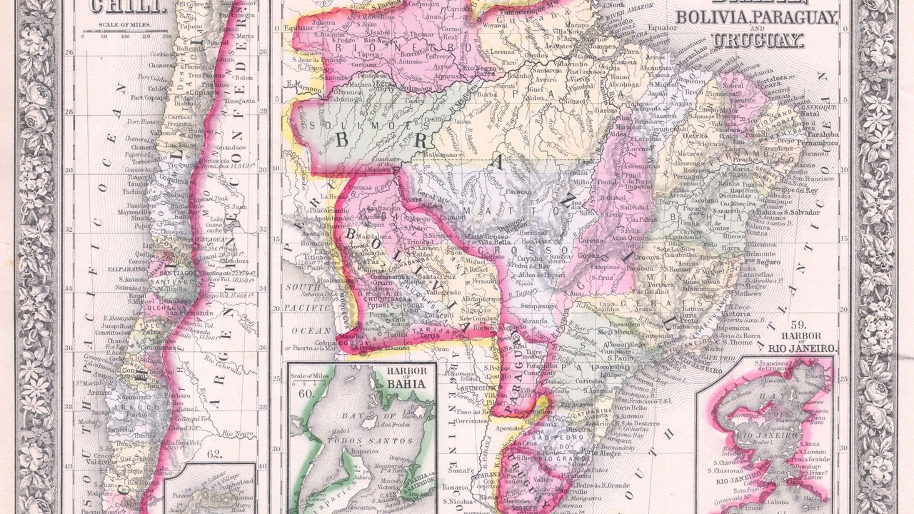 Busy border market at Ciudad del Este with trucks and pedestrians