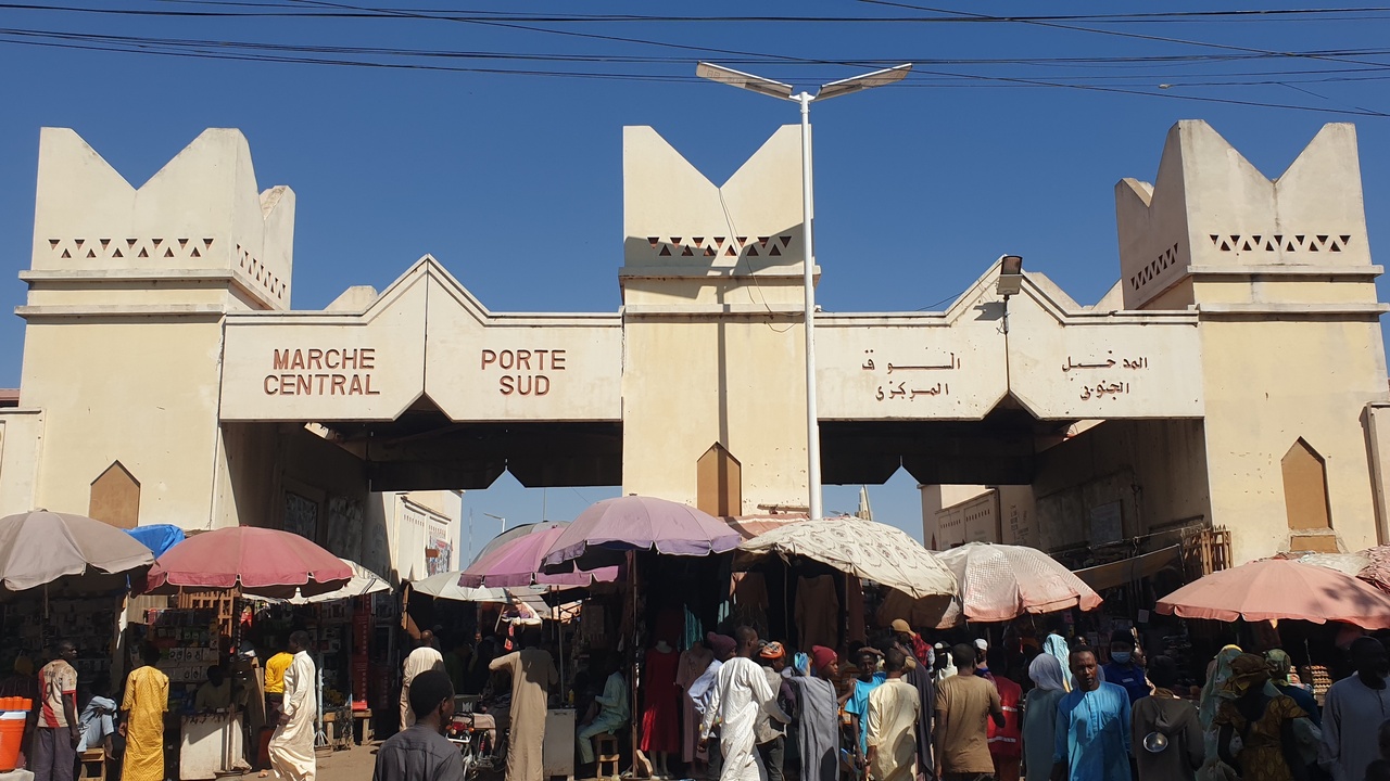 N'Djamena market stalls along the Chari River with colorful textiles