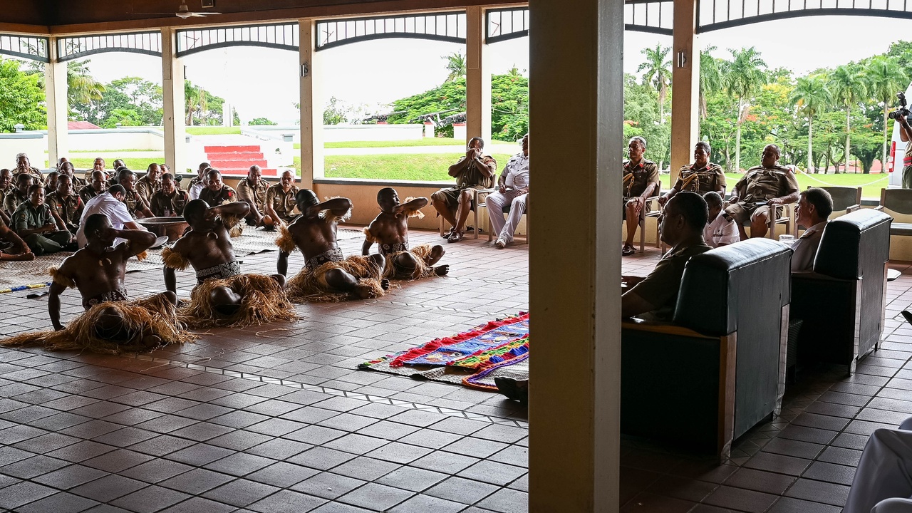 Fijian village kava ceremony with local dancers.