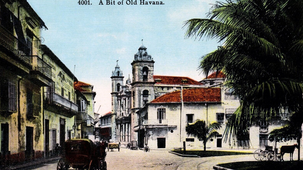 Old Havana streets with vintage cars and colonial facades