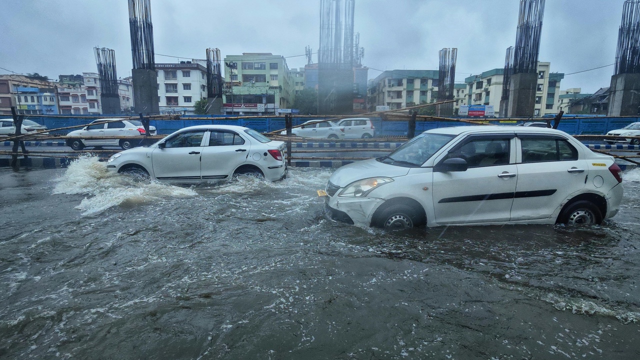 Flooded street and aging infrastructure highlighting environmental and infrastructure risks in Kazakh cities