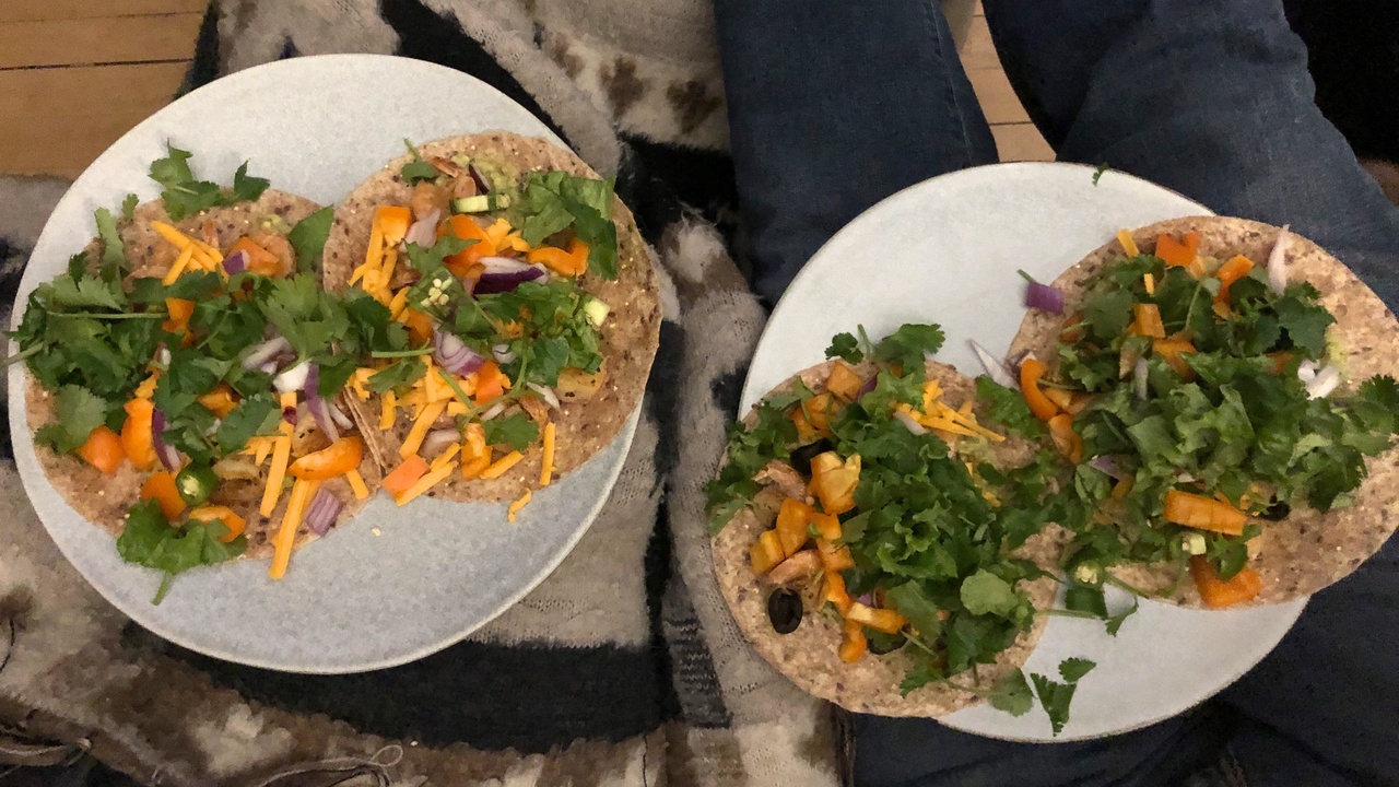 Street tacos and Oaxacan mole served at a market table