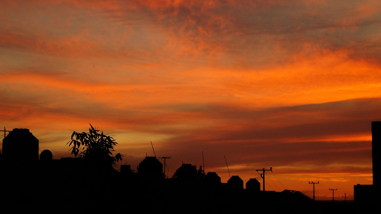 Rooftop bar in La Paz with sunset view of Illimani