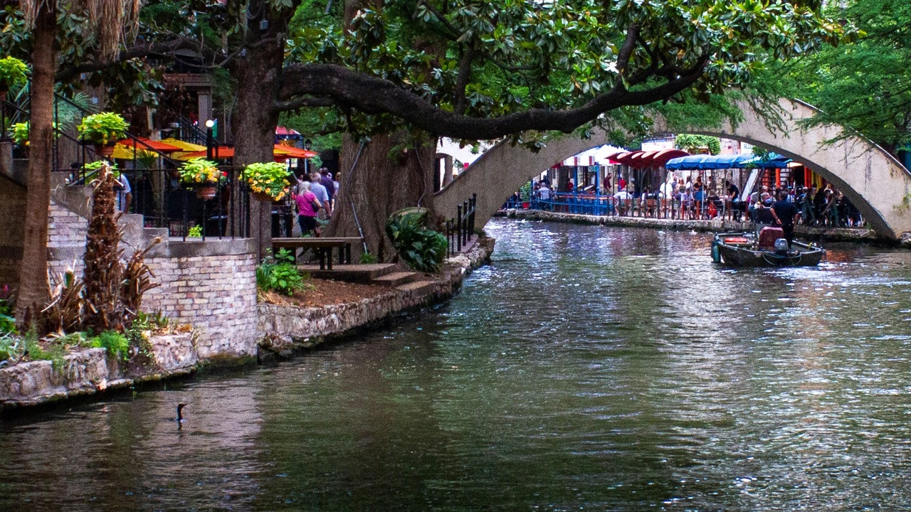 Family enjoying outdoor attractions in San Antonio, including the zoo and caverns