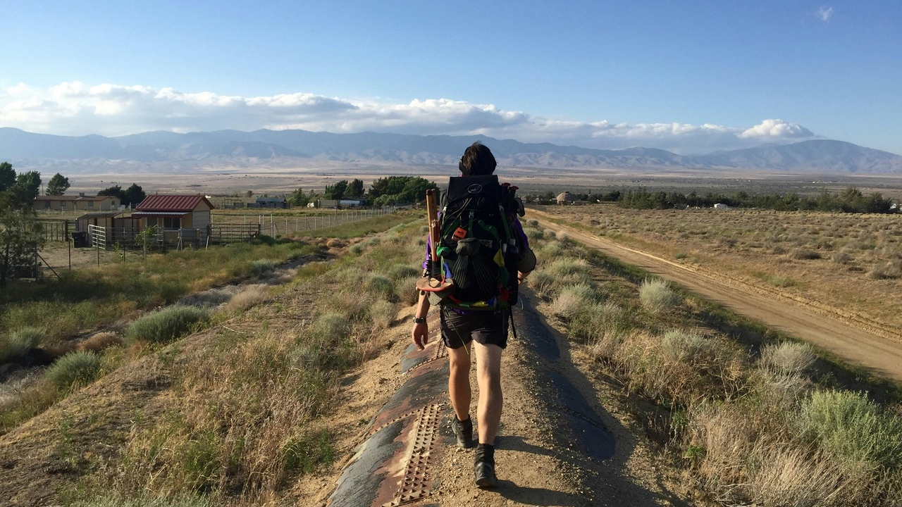 Travelers interacting with local community tourism initiatives in Chad