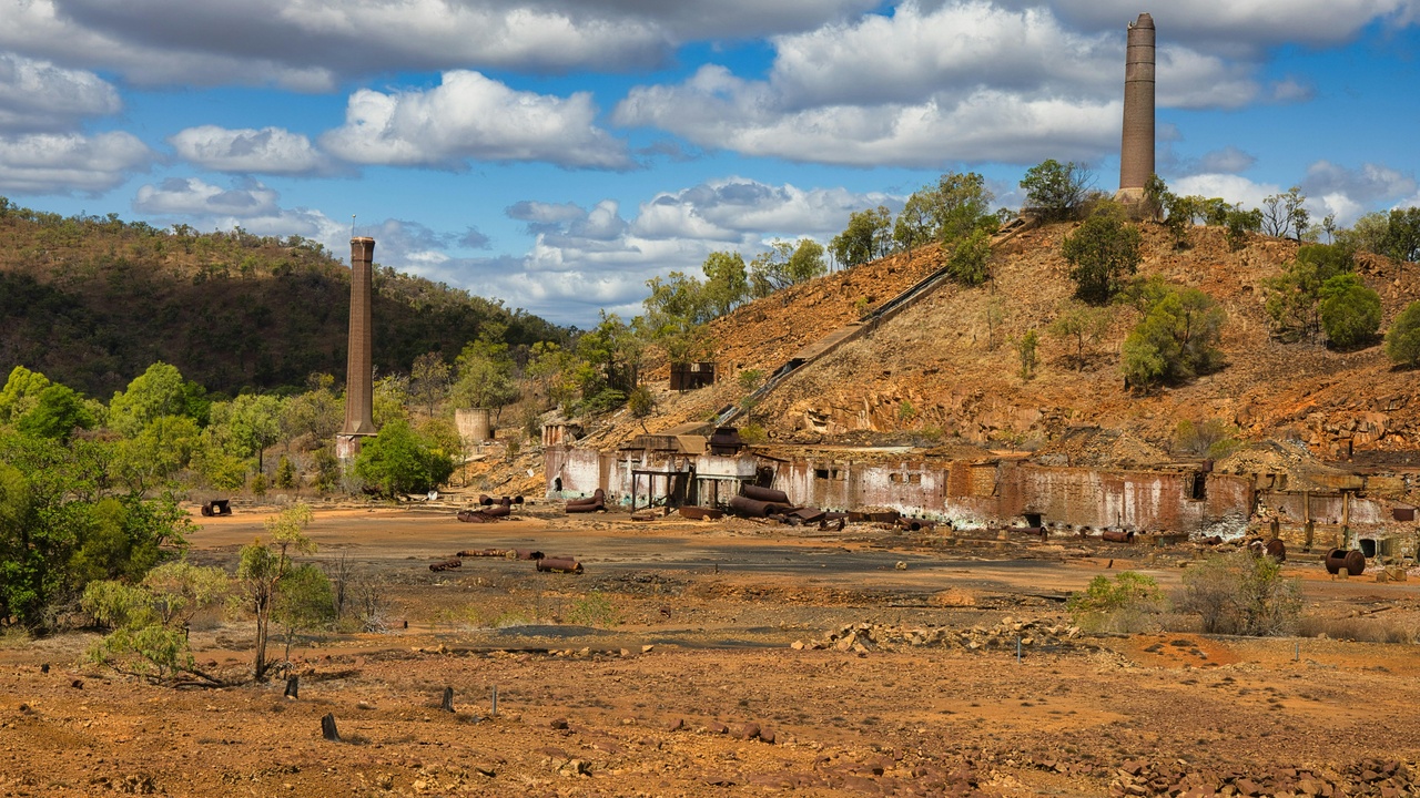 Mining operations and a university research campus representing science and industry contributions