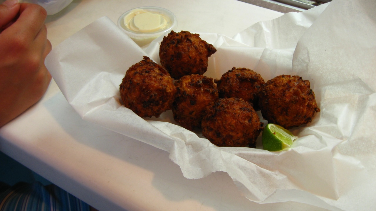Key lime pie and seafood platter on a wooden table in Key West