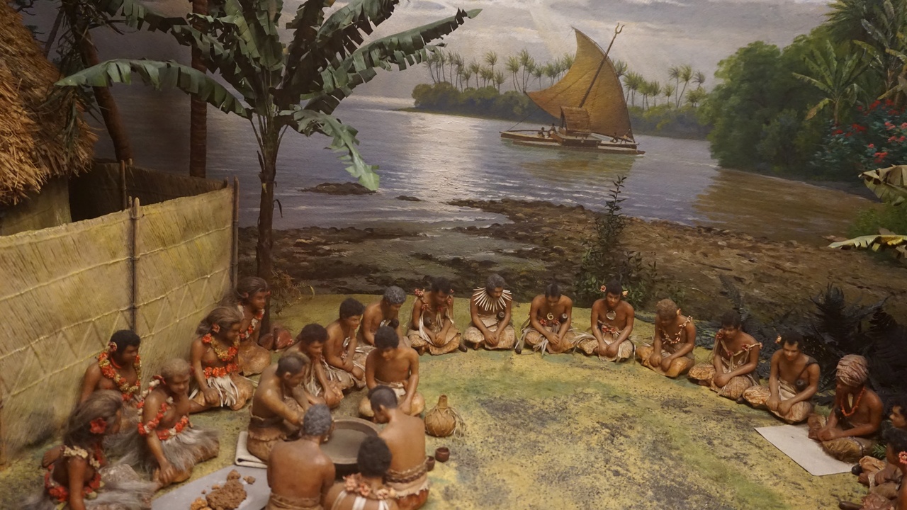 A village kava circle with woven mats and ceremonial bowls.