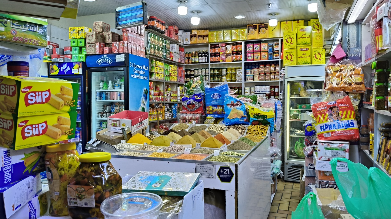 traditional Kuwaiti food, machboos and coffee served in a hospitality setting