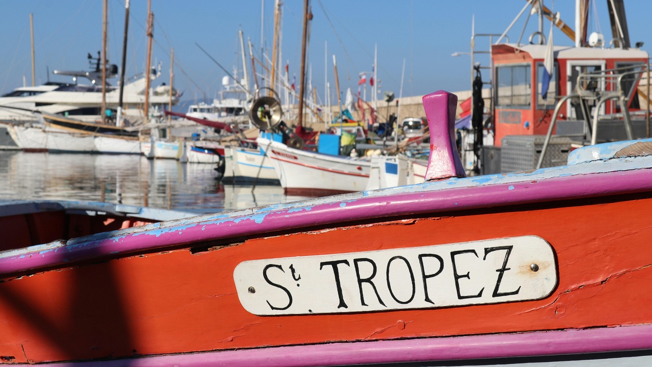 Place des Lices market stalls with colorful produce in Saint-Tropez