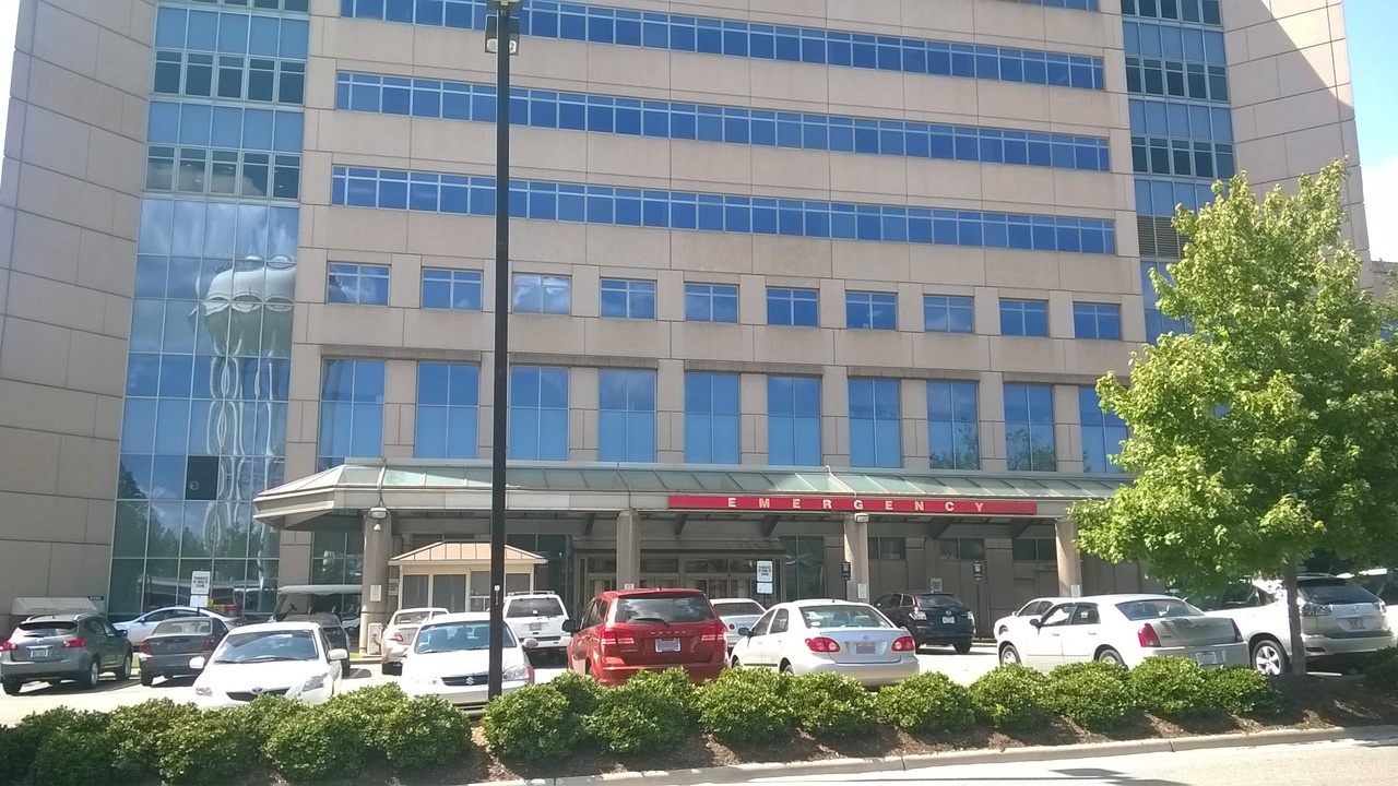 Ambulance and hospital emergency entrance illustrating hospital access and EMS response