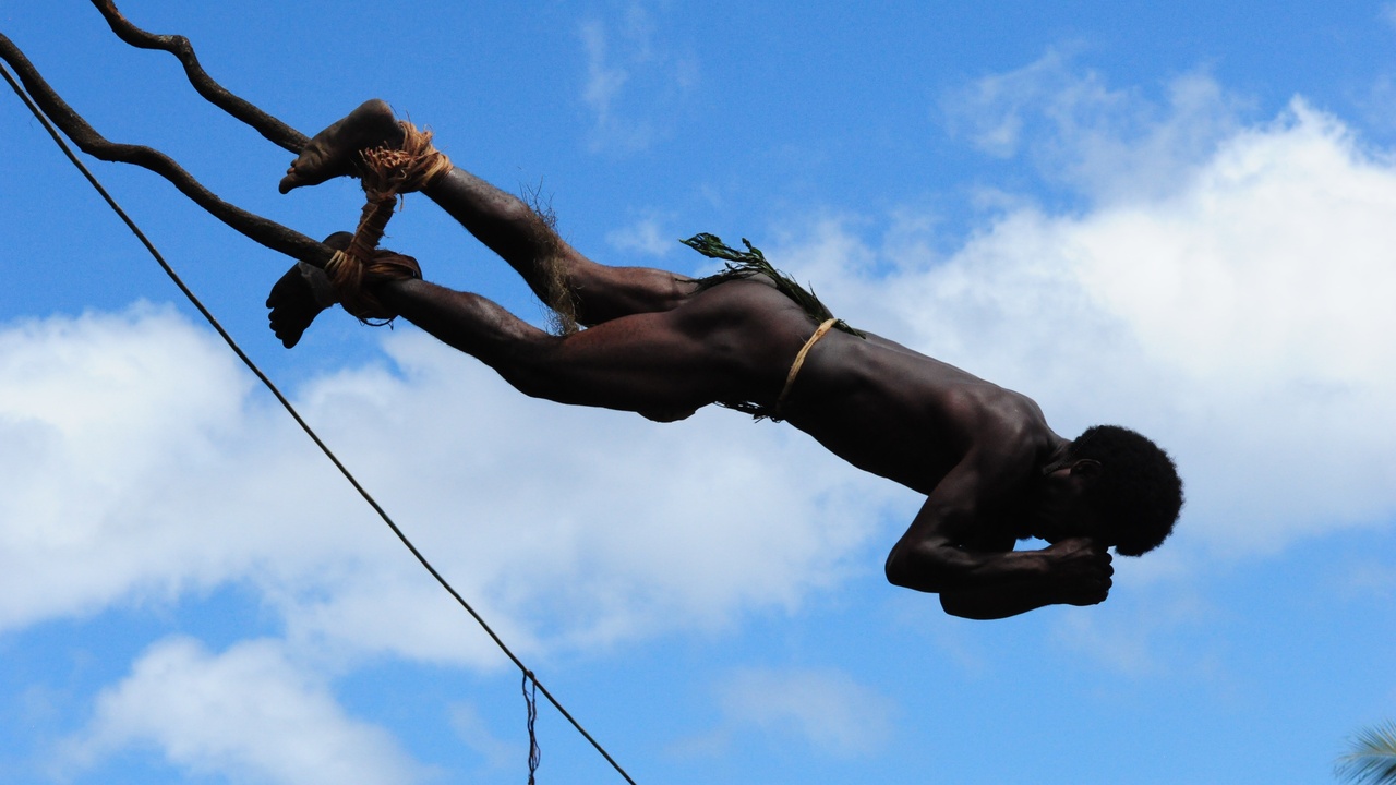 Pentecost land-diving ceremony with tall wooden towers.