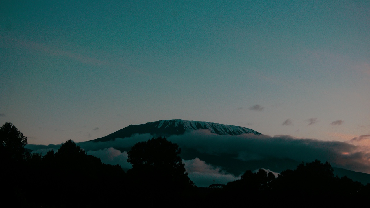 Hikers approaching Mount Kilimanjaro summit