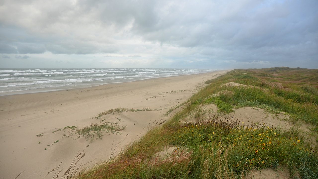 Padre Island sand dunes and kayak on Laguna Madre