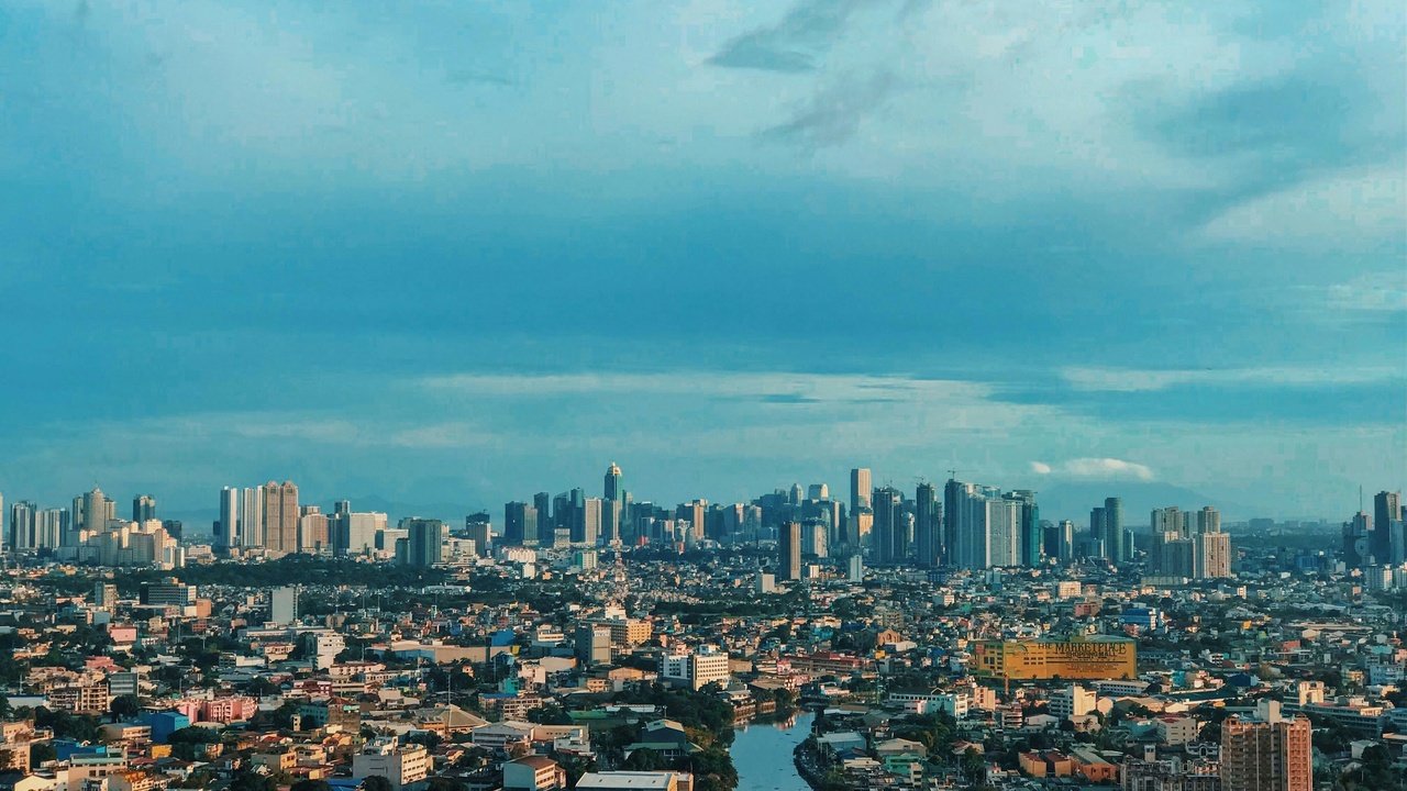 Philippine port at night with city skyline