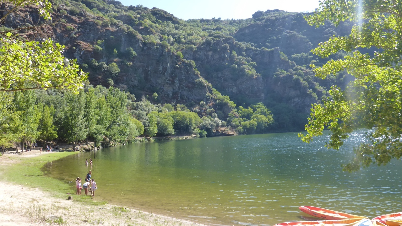 Kayaks and boats on the Douro River near Ribeira waterfront, Porto