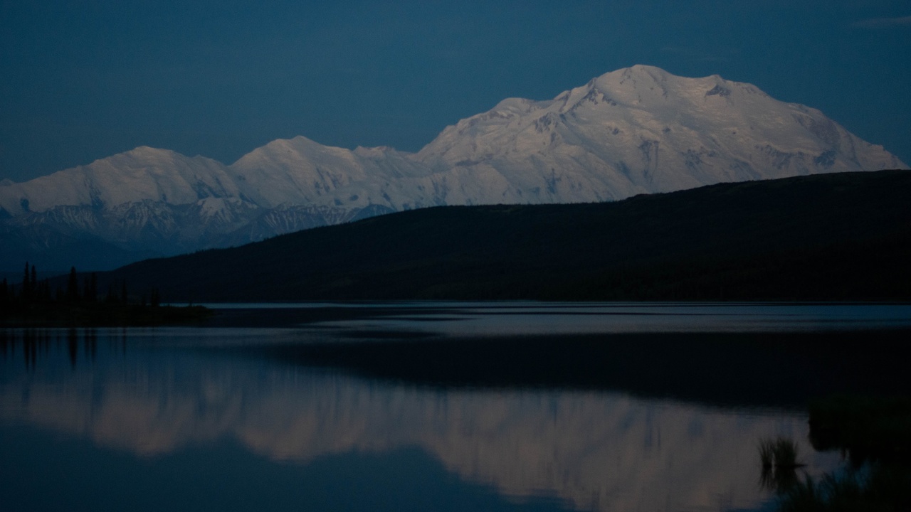 Wonder Lake reflecting Denali on a clear morning with calm water
