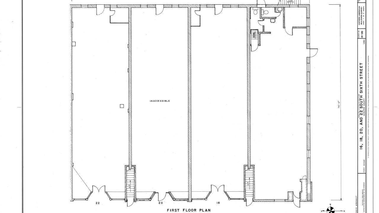 Main Street in a small Iowa city at dusk, representing community-level safety issues.