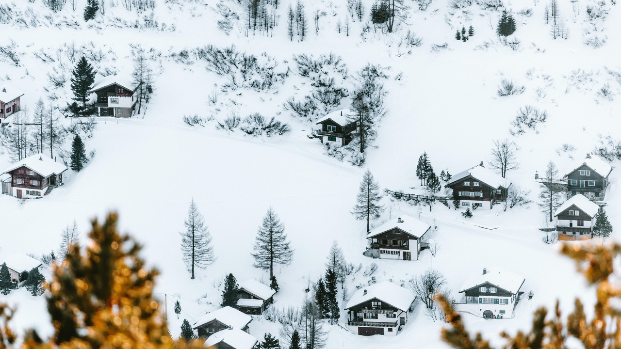 Malbun ski resort with alpine slopes and distant Grauspitz peak