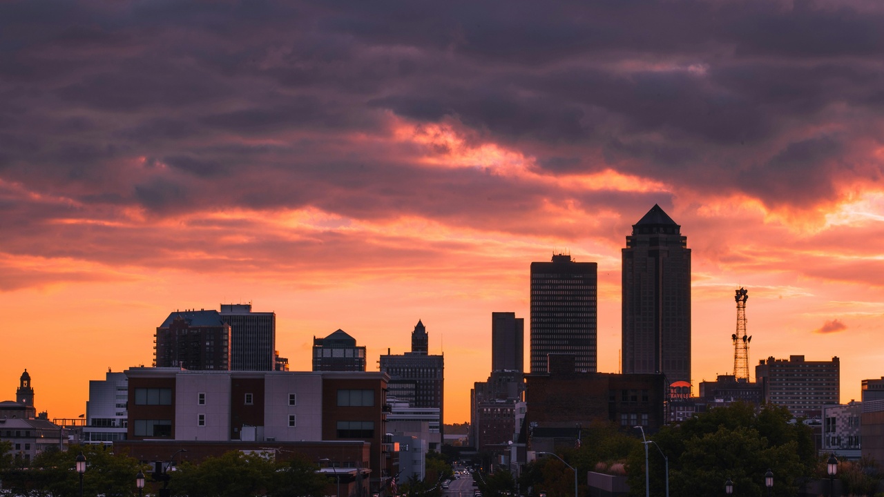 Des Moines downtown at dusk, representing urban crime and policing challenges