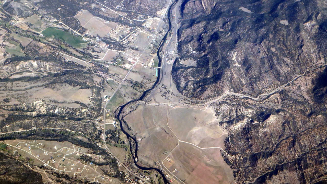 Kayaker on the Mississippi River with sunset