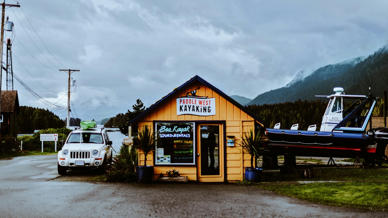 Alaska Native Heritage Center longhouse demonstration with dancers in traditional regalia