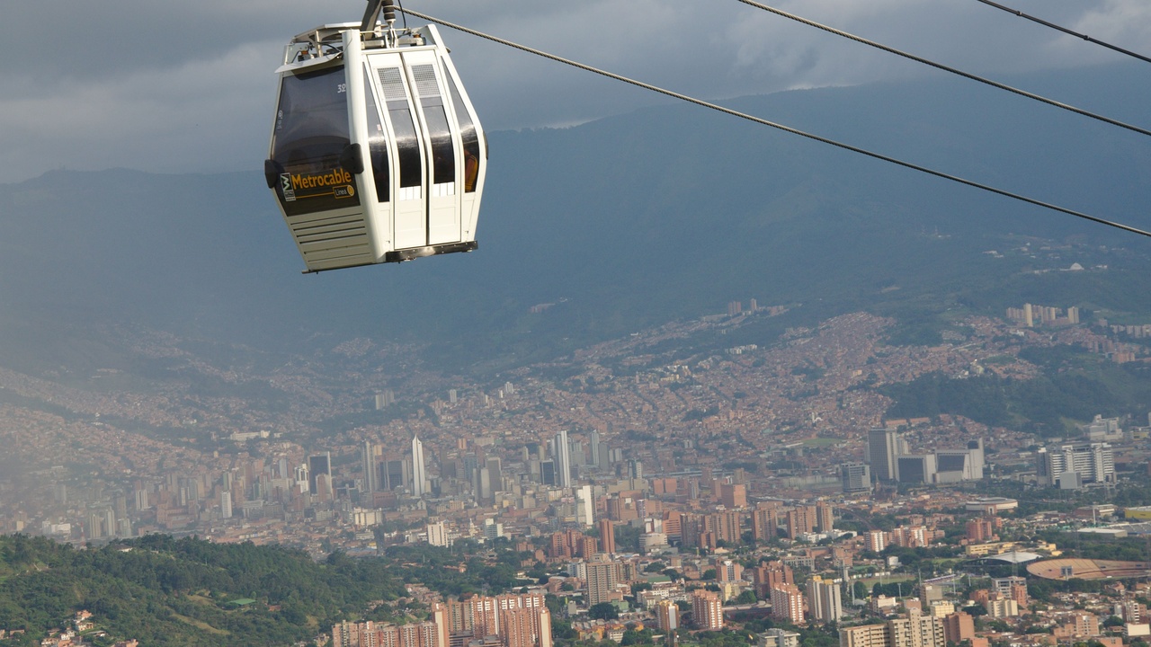 Cable car over Medellín with mountains and city skyline
