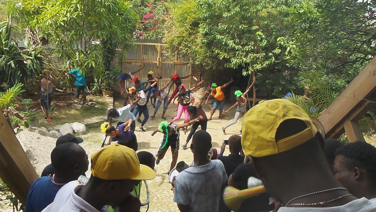 Vibrant Haitian street market with art and music