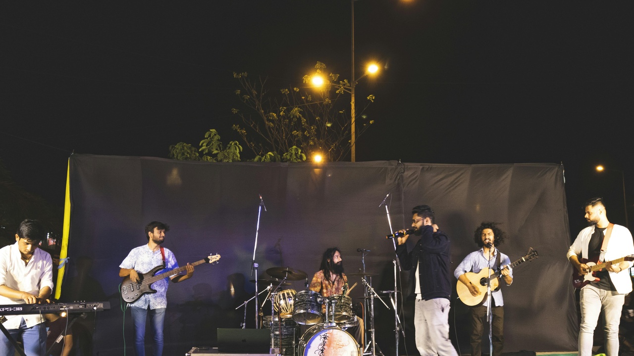 Colorful artisan stalls and people walking near Sayulita town plaza
