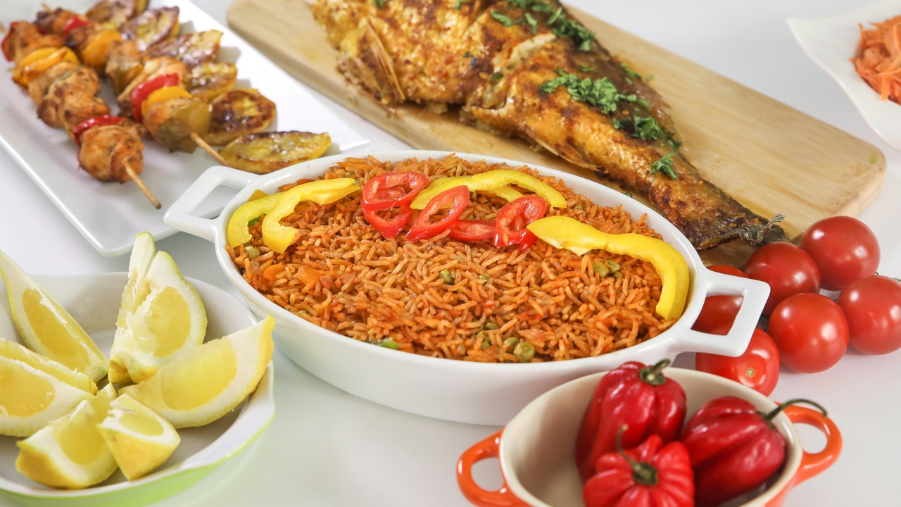 Women preparing cassava-based meal in a Liberian village kitchen.