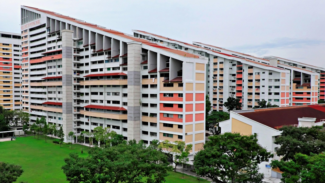 Students studying with city skyline, representing cost of living and tuition