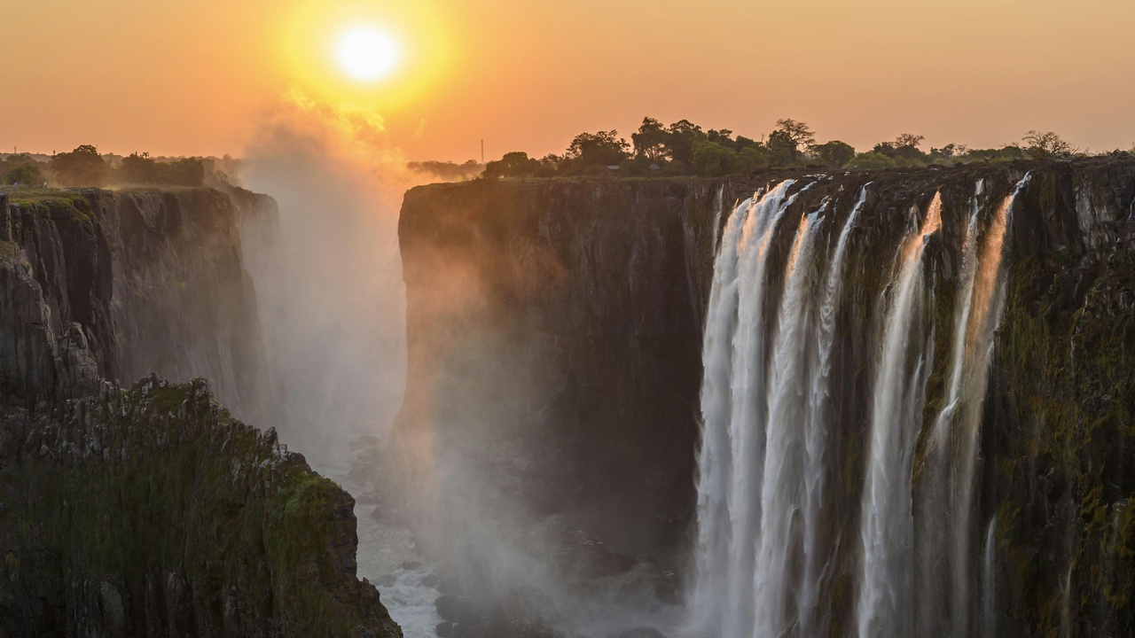 Victoria Falls waterfall and spray over Zambezi gorge