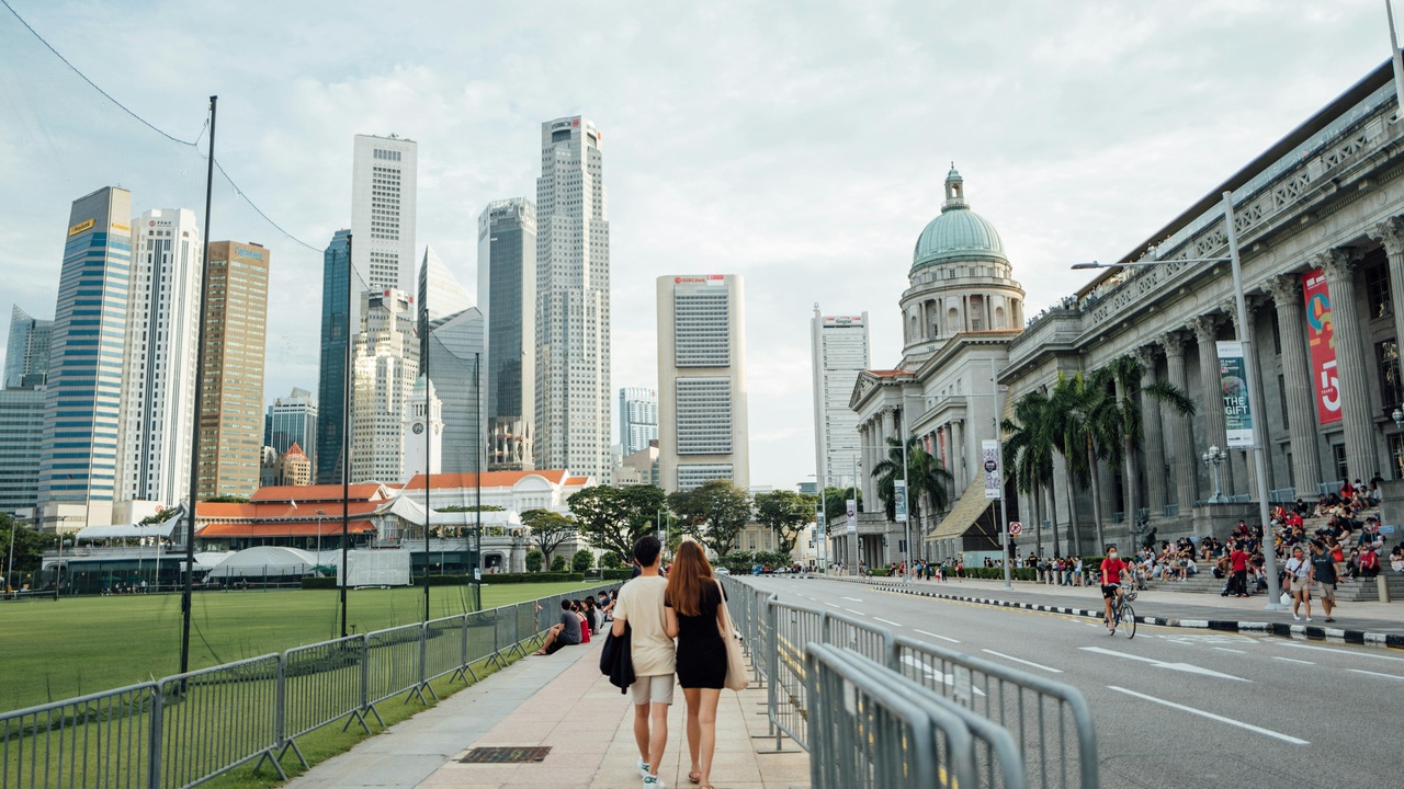 Student Pass documents and housing keys representing visas and housing challenges