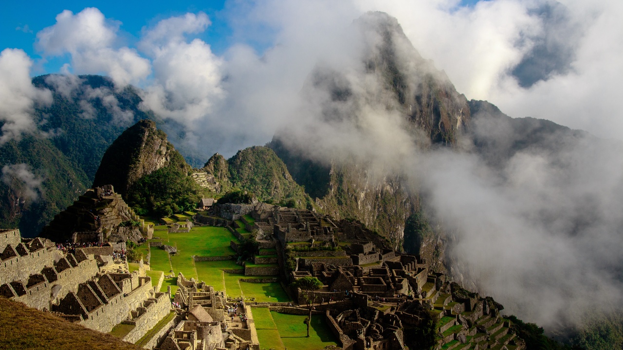 Machu Picchu terraces seen from the Sun Gate at sunrise.