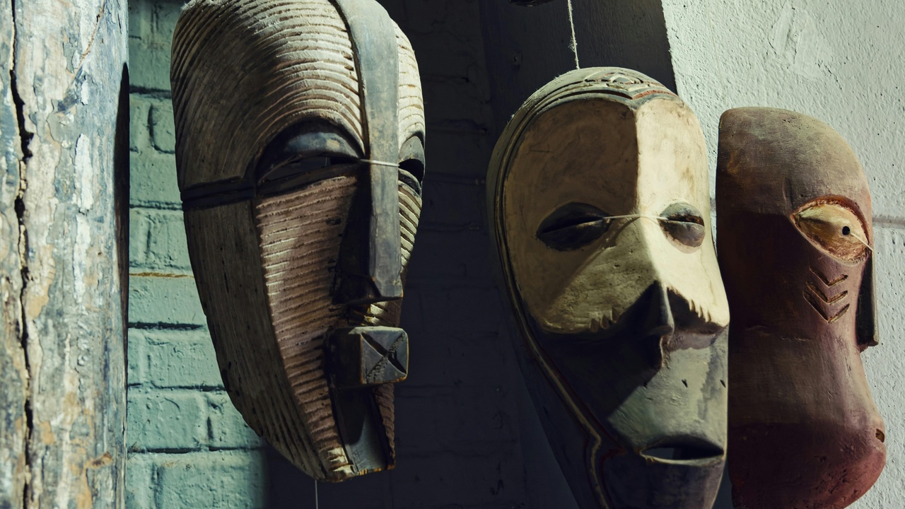 Joninės bonfire and masked performers in a Lithuanian village