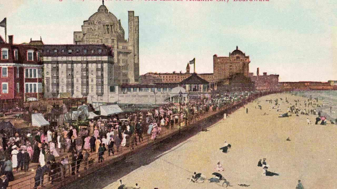 Atlantic City Boardwalk and beach with Steel Pier in the distance