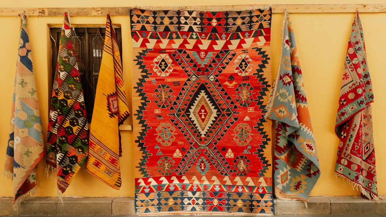 Malagasy lamba textiles and performers at a festival on Nosy Be