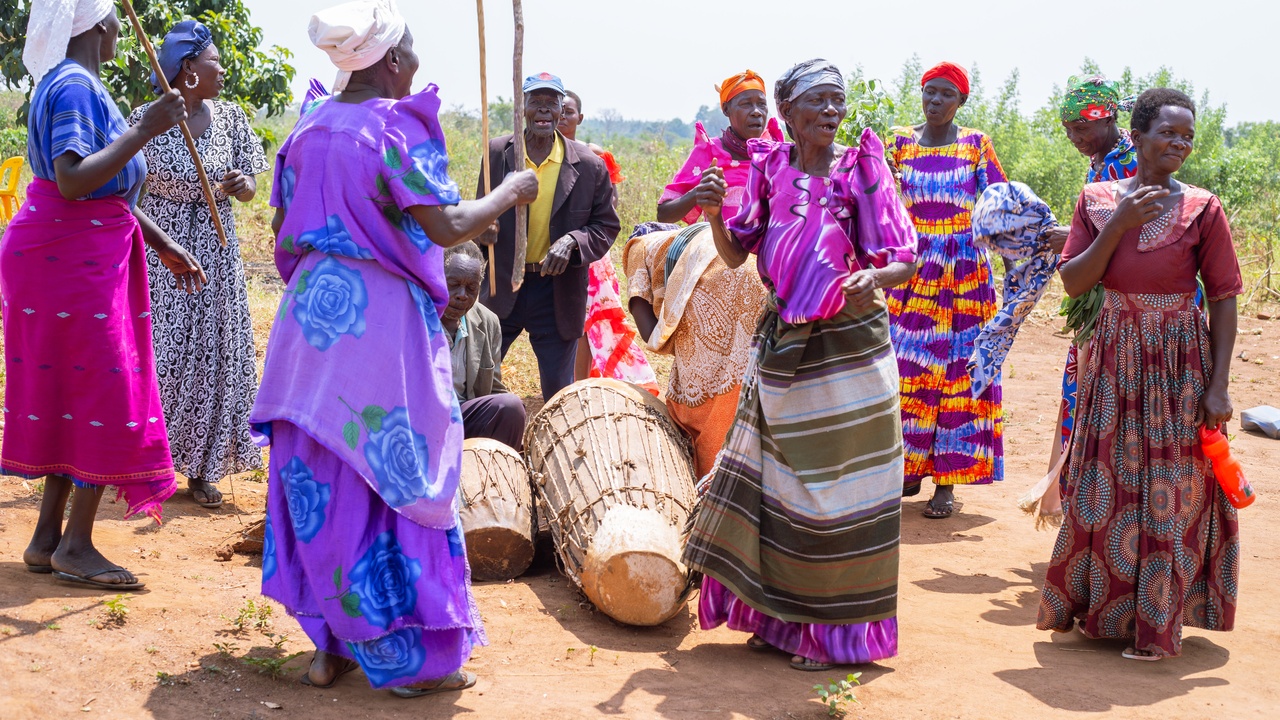 Traditional Baganda dancers and a busy Kampala street scene