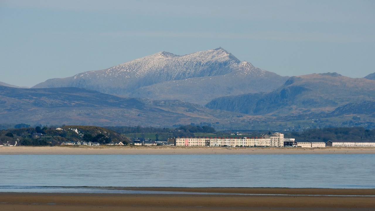 Hikers on Snowdon with sweeping mountain views