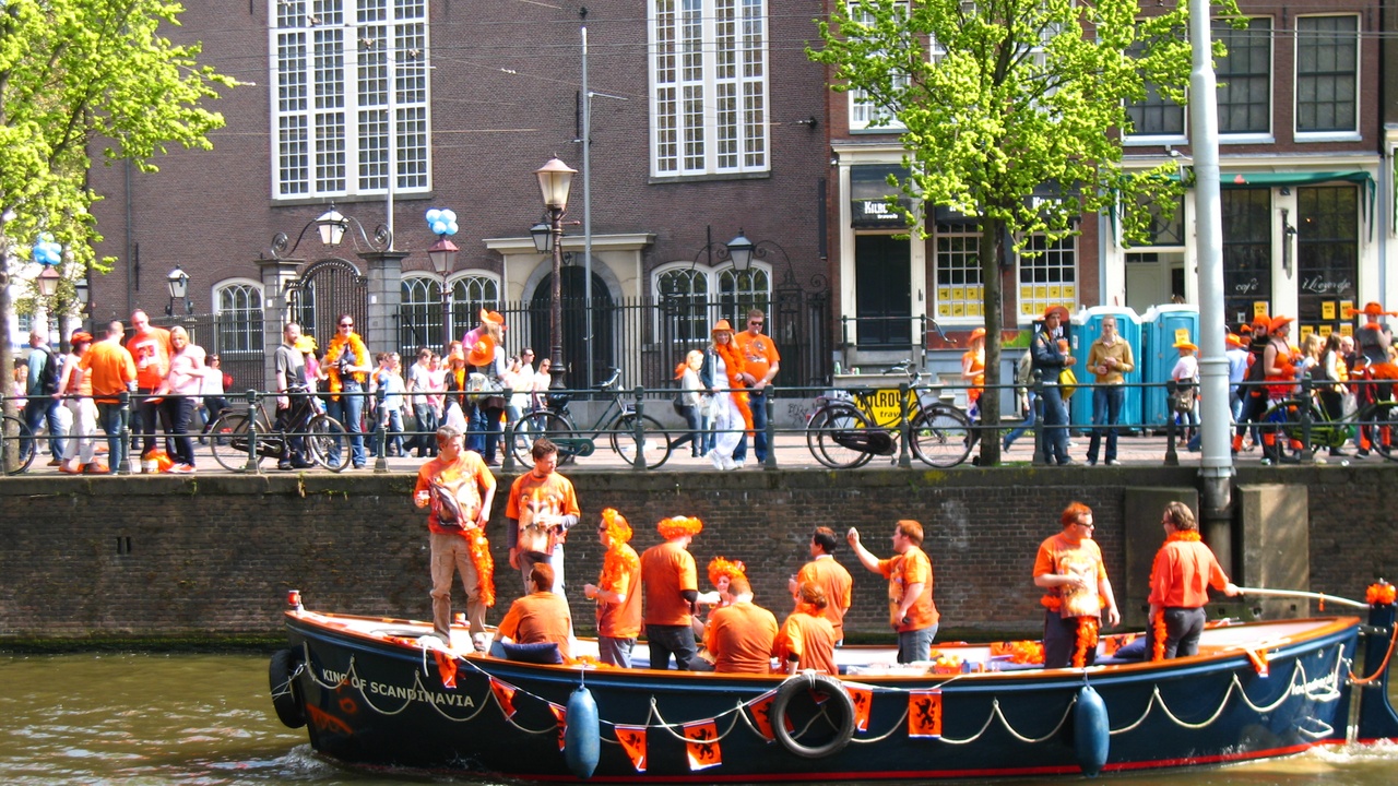 Crowd celebrating Dutch national holidays, orange-clad King's Day crowd and Sinterklaas parade