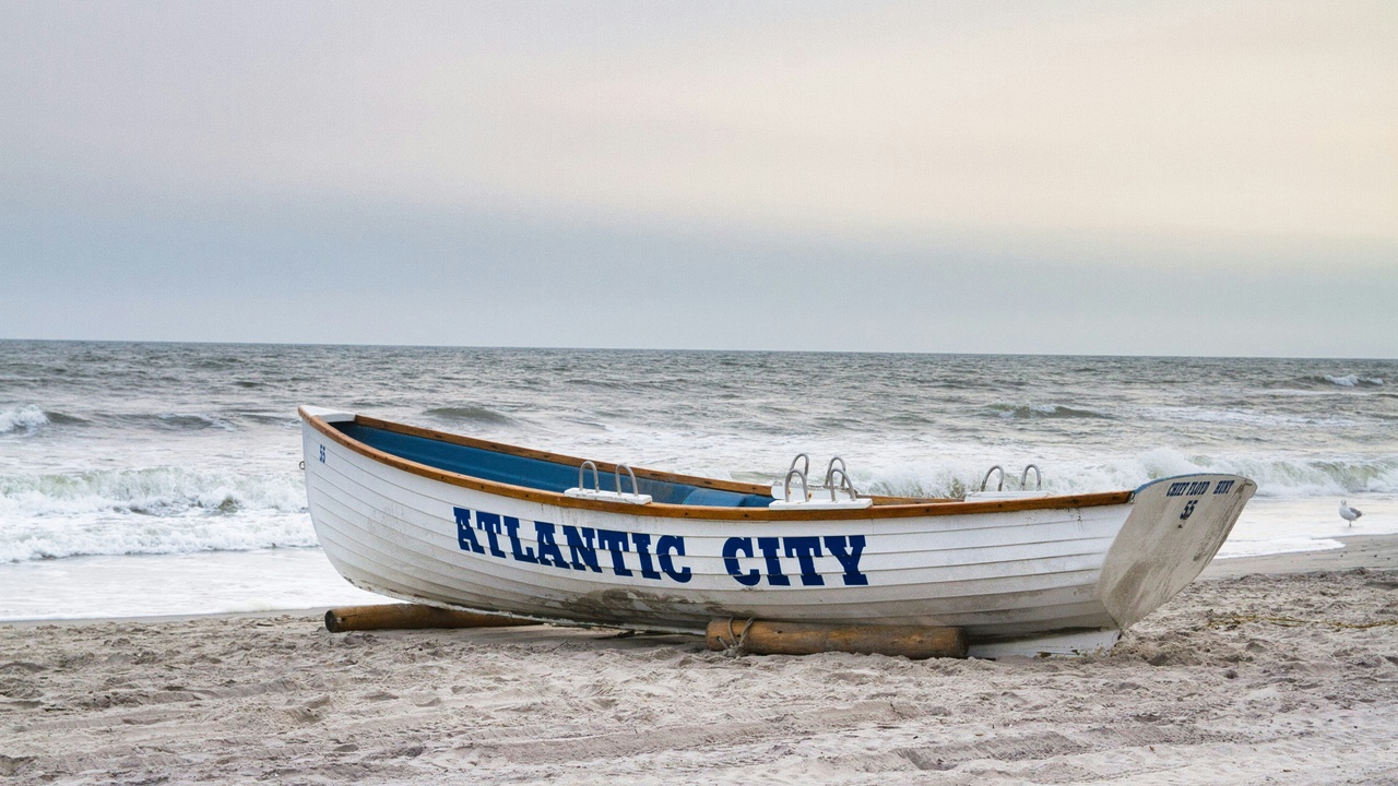 Boardwalk food stands and Absecon Lighthouse in Atlantic City