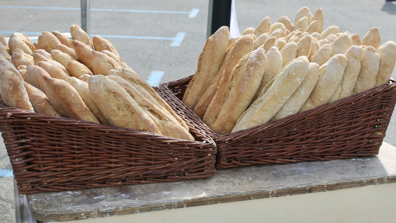 Selection of German breads and a café table with coffee and cake