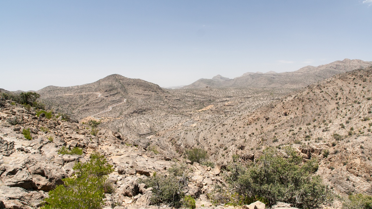 Jebel Akhdar terraces and coastal cliffs with green patches