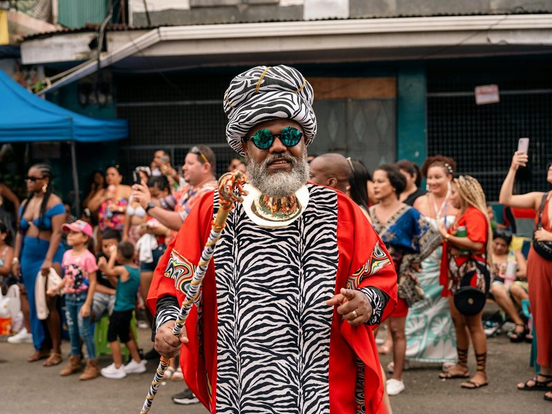 Colorful street festival in Limón, showcasing Afro-Caribbean culture with music and dance.