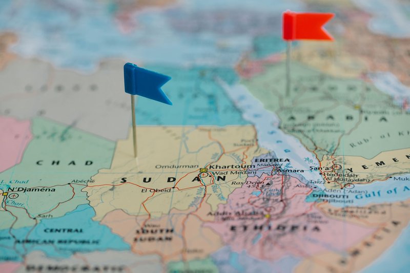 Detailed close-up map of Africa featuring Sudan and nearby countries marked with flags.