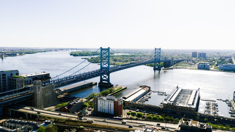 Stunning aerial shot of Benjamin Franklin Bridge spanning the Delaware River in Philadelphia, Pennsylvania.